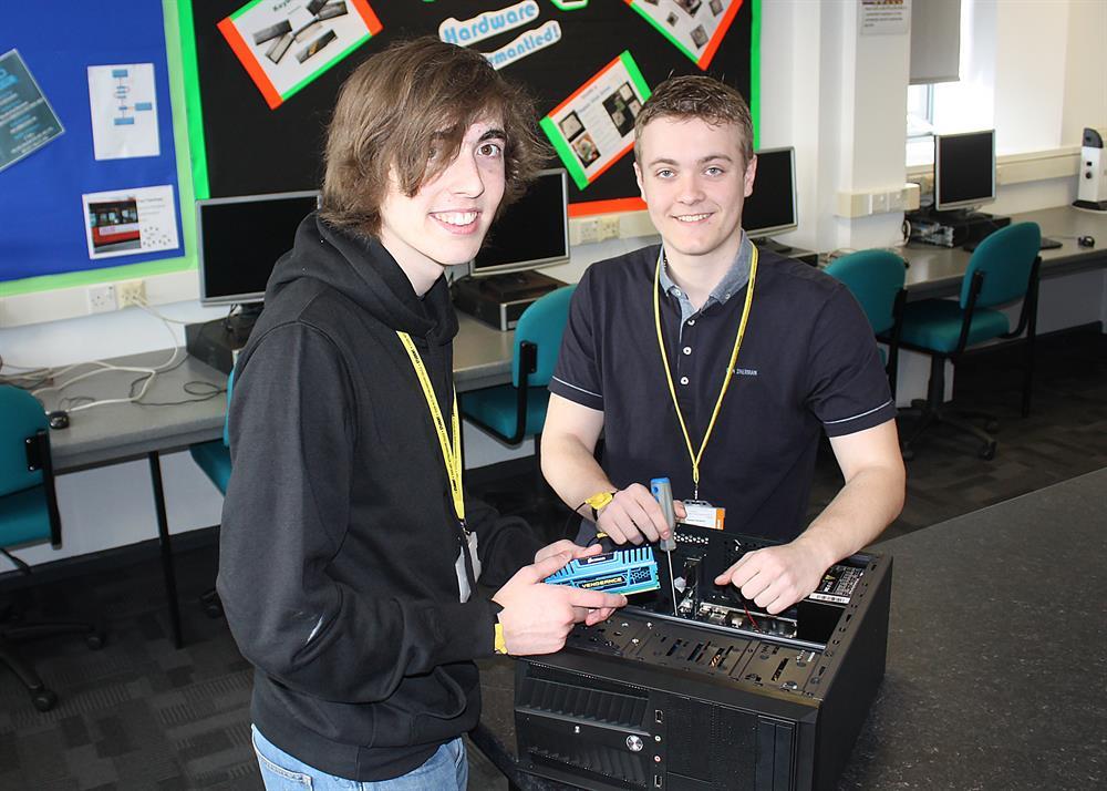 WorldSkills competitors Edwin (left) and Tom show-off their IT technician skills at college.