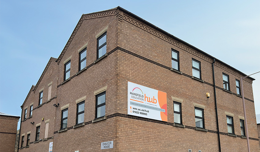 Town centre location with nearby cafés, shops, and food outlets.