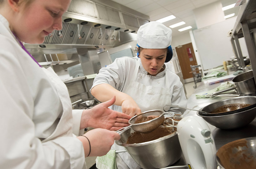 You’ll learn to cook in our busy, industry-style kitchens.
