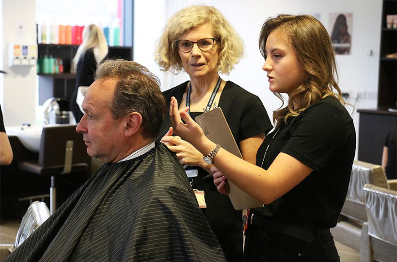 College Cuts above the rest - Barbering students have been busy promoting their learning company, College Cuts, to boost sales and practice their new skills.