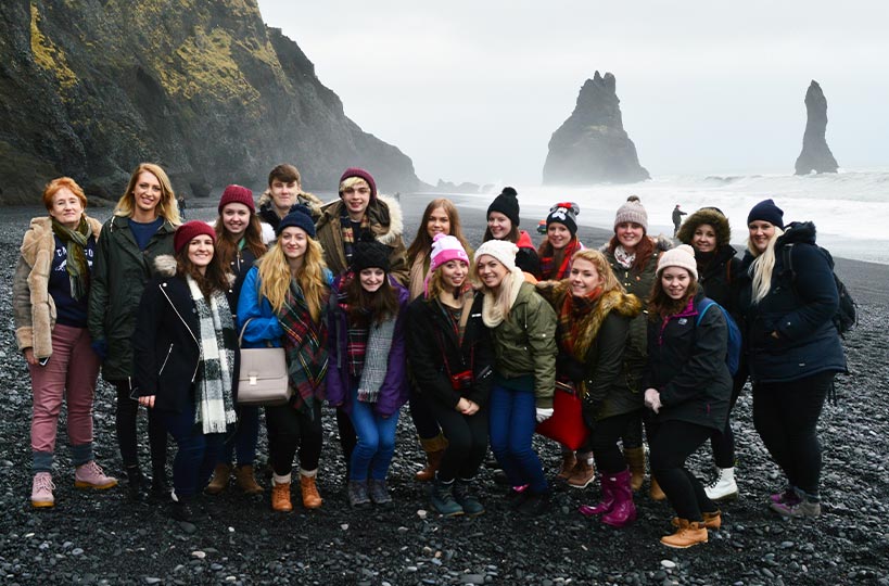 Take part in exciting travel opportunities! Students had a blast exploring the unique black sands on Reynisfjara Beach, Iceland. 