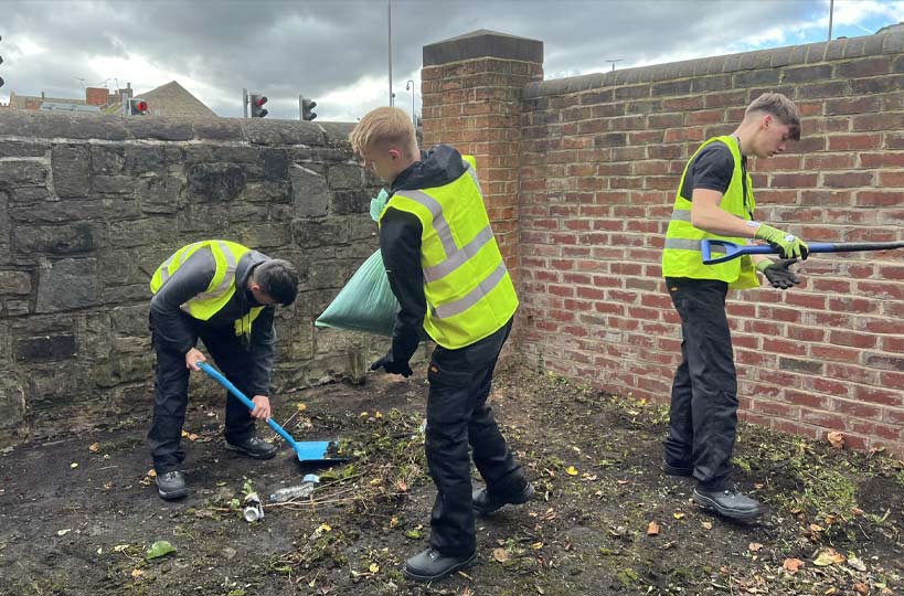 Construction students swapped their workshops for a dental surgery, all in aid of a makeover for a Mansfield town centre-based dental practice’s grounds and car park.