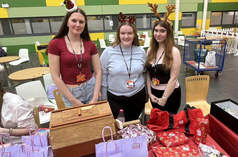 Students and their teachers host a bustling and glittering Christmas market at the Derby Road campus.