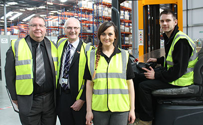 photo of people at work in a warehouse