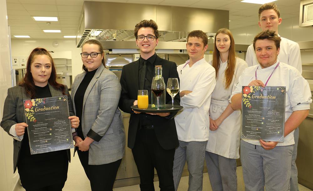 Graduating students (from left) Chloe Boyles, Aimee Field, Lewis Thorpe, Richard Smith, Georgia McGuiness, Nathan Kirby, and (back) Jack Kelly, will be serving-up a culinary treat in Refined.