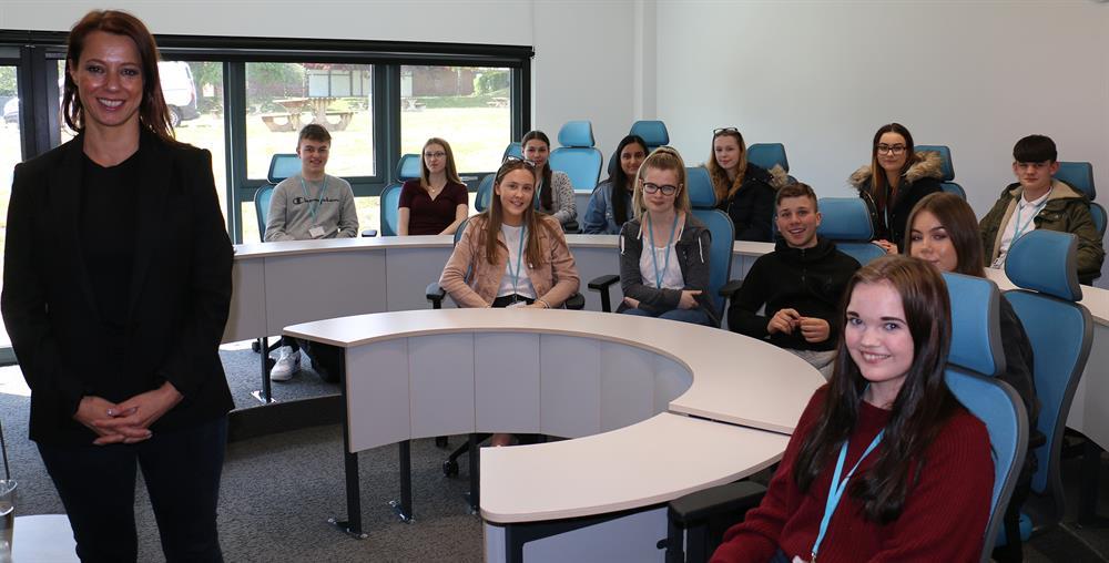 Politics and sociology students pictured with Ashfield MP Gloria De Piero (left) after the question and answer session at the college.
