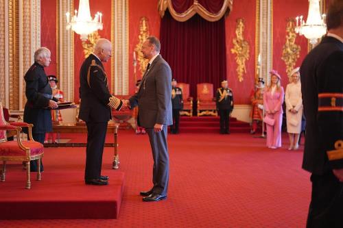 College principal awarded MBE at Buckingham Palace